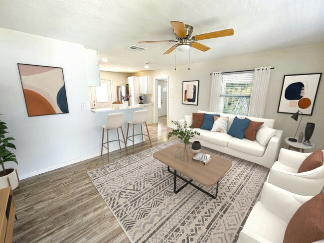 Building Photo - fully renovated 2-bedroom, 1-bathroom home with bonus guest room or office and oversized fenced yard