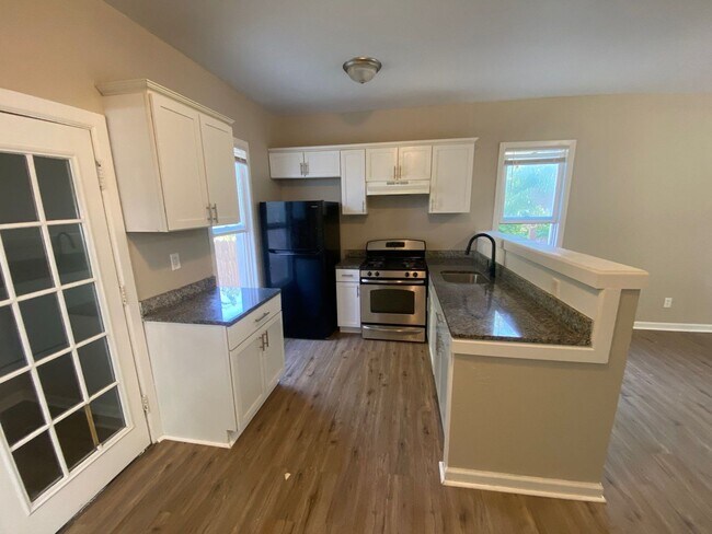 Building Photo - Fully Renovated 4-Bedroom Home – Move-In R...