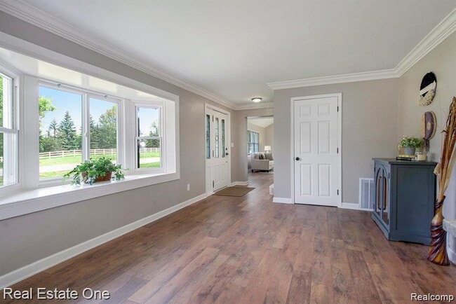 Building Photo - 51275 W Seven Mile Rd