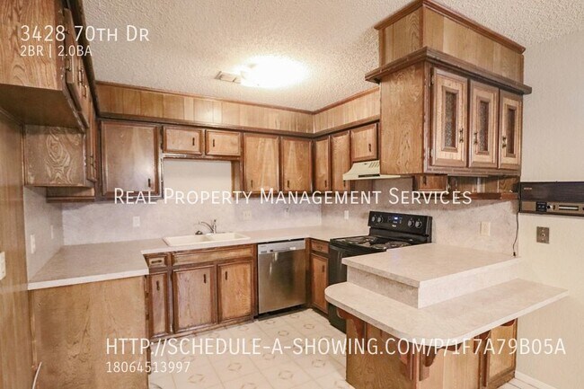 Building Photo - Lovely 2/1.5/2 Duplex