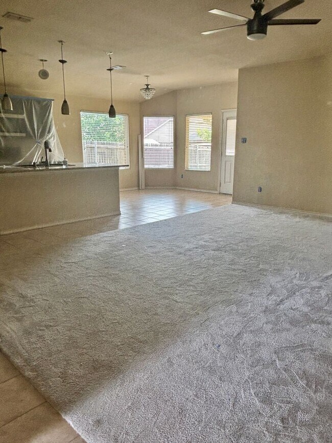 Building Photo - COMING SOON! Greenbelt Views & Giant Yard — Freshly Painted 4BR in Golden Pond