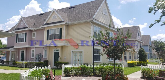 Foto del edificio - 4 BR / 3 FULL BATH (INCLUDES 2 MASTERS) 2 STORY (NEAR DISNEY!) GATED COMMUNITY WITH COMMUNITY POO...