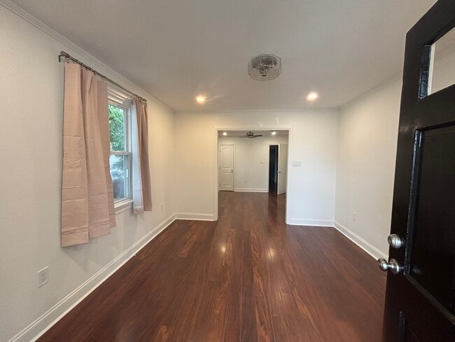 Front room into first bedroom - 3657 Derbigny St