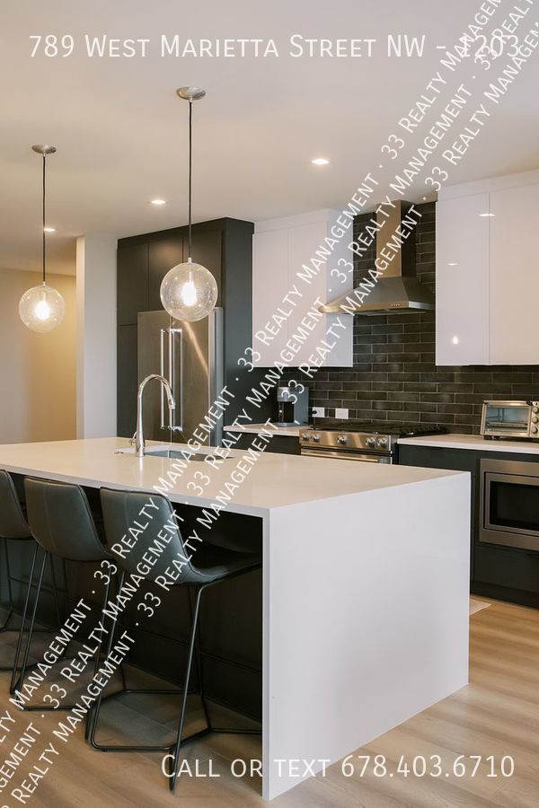 Building Photo - Modern West Midtown Condo Available for Re...
