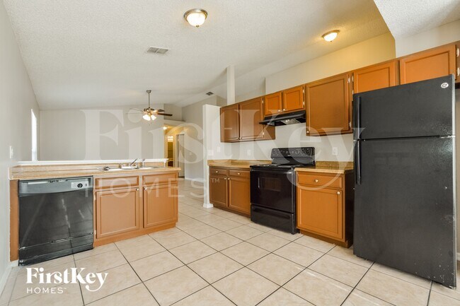 Building Photo - 7571 Groveoak Dr