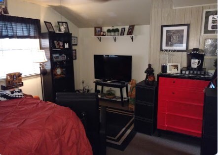 1. Bed and TV Area - 304 Woodland Dr