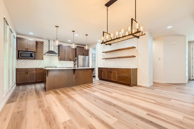 Kitchen & Access to Pantry Room - 19121 1st Dr SE