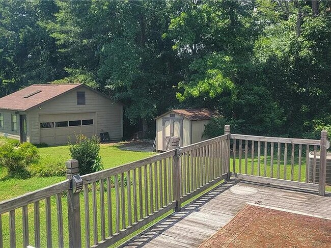 Building Photo - Earn Wealth While Leasing - Like a Homeown...