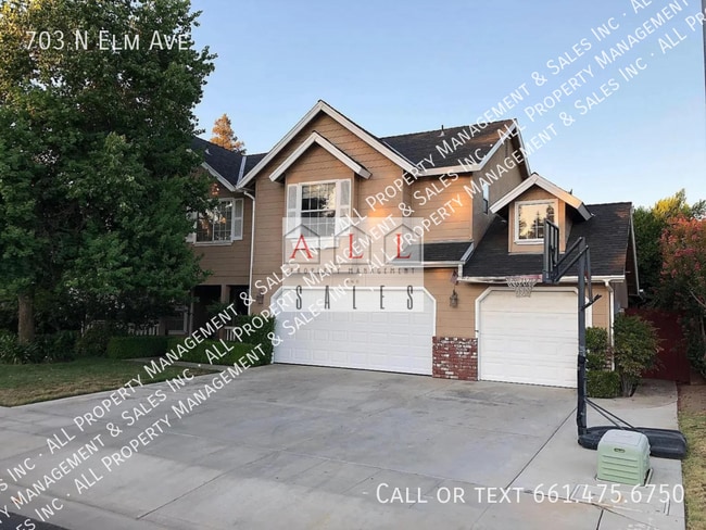 Building Photo - 703 N Elm Ave