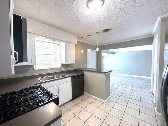 Foto del edificio - 1104 Kinney Ave