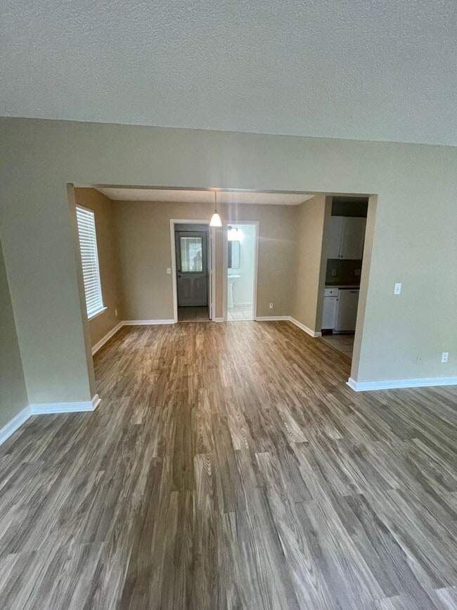 Building Photo - Spacious 4-Bedroom, 2-Bath Home with Fenced Backyard & Lawn Care Included