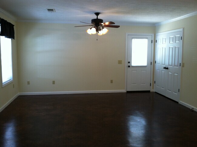 Living Room with Laundry Closet - 1036 Sun Creek Rd