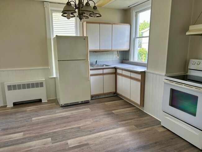 Kitchen new floors - 213 S Central Ave