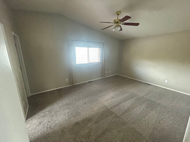 Master Bedroom Vaulted Ceilings East facing Morning Light - 970 Apollo Ct