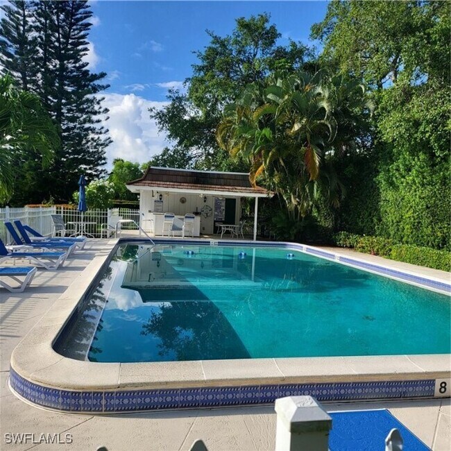 Building Photo - ** 2/2 FIRST FLOOR UNIT ** DELNOR-WIGGINS STATE PARK AND BEACH ** STEPS AWAY FROM POOL ** SEASONA...