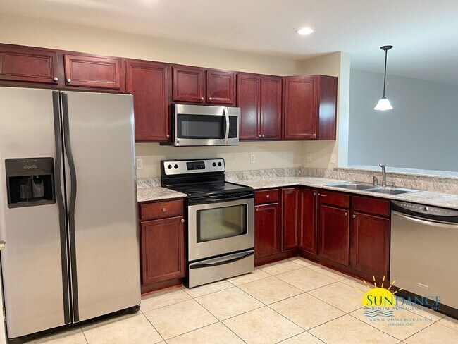 Foto del edificio - Great 2 Bedroom Townhouse Near Both Bases