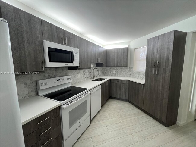 Building Photo - 5850 Camino Del Sol