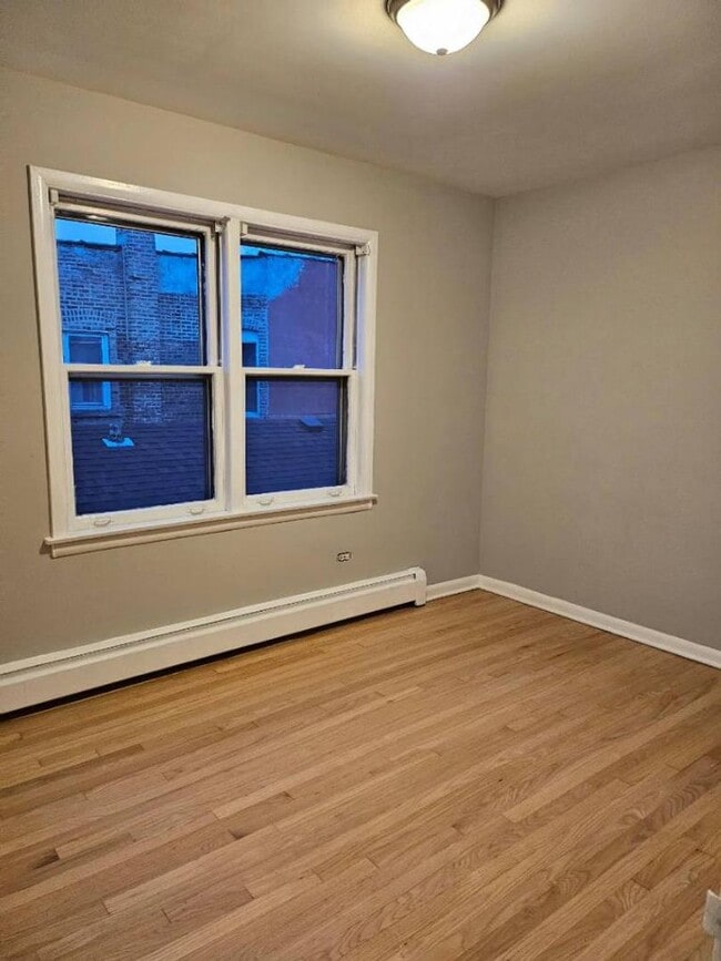 Building Photo - 5858 W Diversey Ave