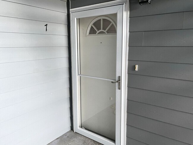 Building Photo - Ground Level River View Condo