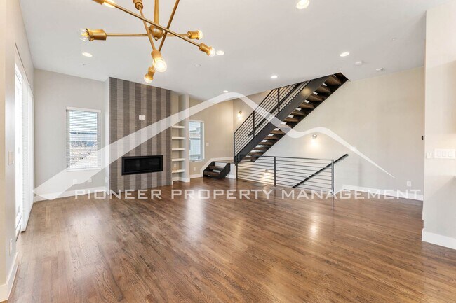 Building Photo - Fantastic Townhome with A Roof Top Patio, Attached Garage, and Central AC!