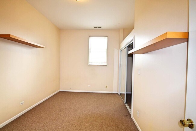 Building Photo - 1027 S Oakley Blvd