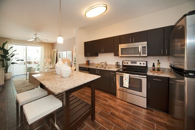 Kitchen with Island - The Point at Coral Gables
