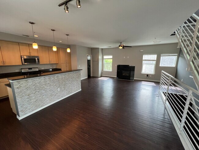 Open floor plan and fireplace - 2606 Wilson St