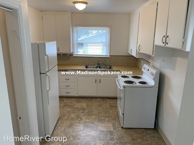 Building Photo - 3 br, 1 bath House - 1323 E. 41st Avenue
