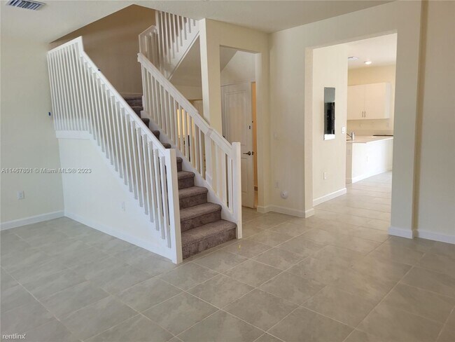 Building Photo - 3 br, 2.5 bath House - 11446 W 33rd Way