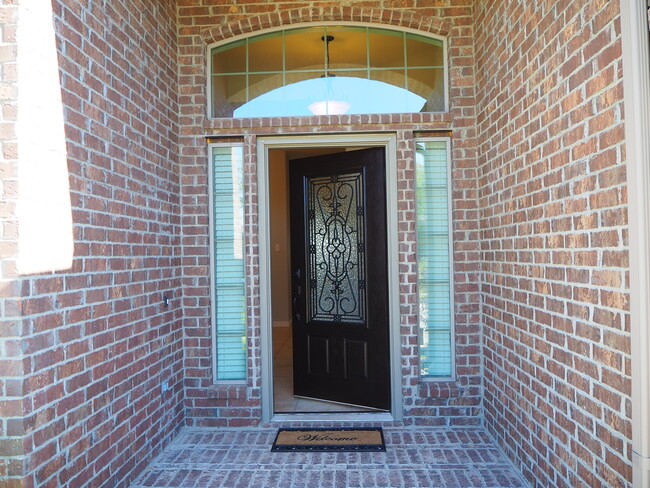 Welcome home. Beautiful entry door with sidelights. - 2130 Hartley Dr