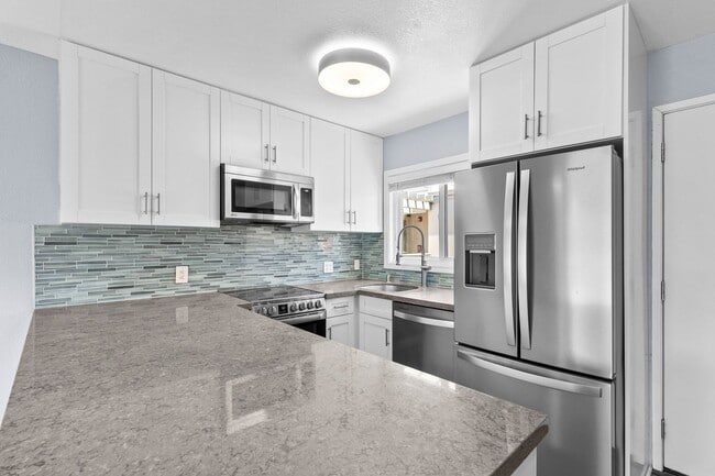 Building Photo - Pristine Two bedroom Two bath condo with b...