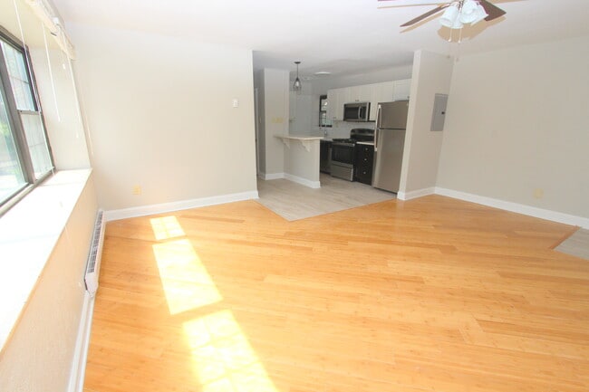 The Bentley - Renovated Living Room - Apartments on Fifth