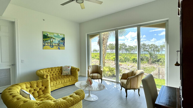Sunroom and Backyard Water views - 28 Harbour Isle Dr W