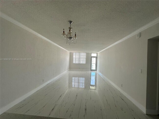 Building Photo - 19390 Collins Ave