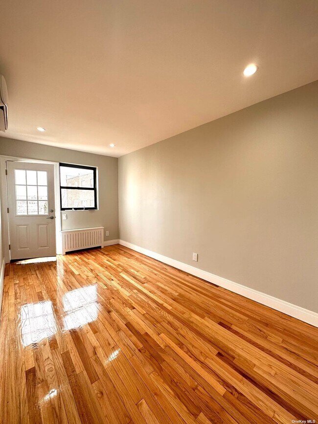 Building Photo - 64-11 60th Pl