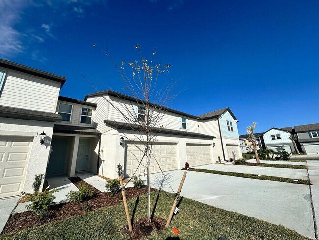 Building Photo - Your BRAND NEW Watergrass townhome is read...
