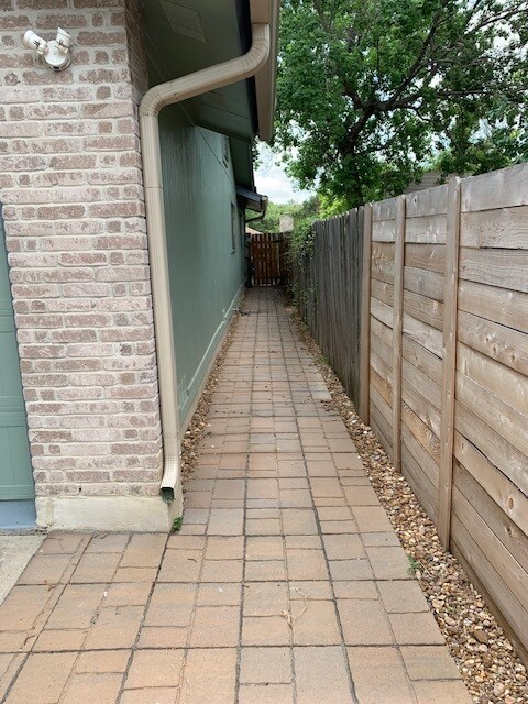 Paved side yard to back gate - 7242 Frontier Ridge Dr