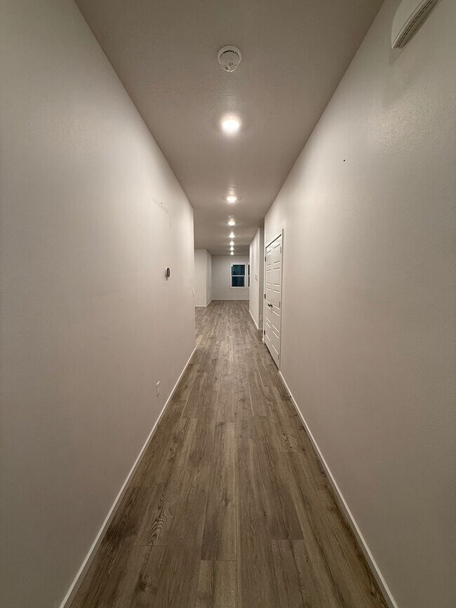 Building Photo - New Construction 4 Bed Mead School District Rancher w/ Fully-Fenced Yard and Attached Garage!