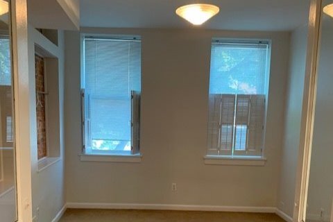 front room with exposed brick - 1047 S Charles St