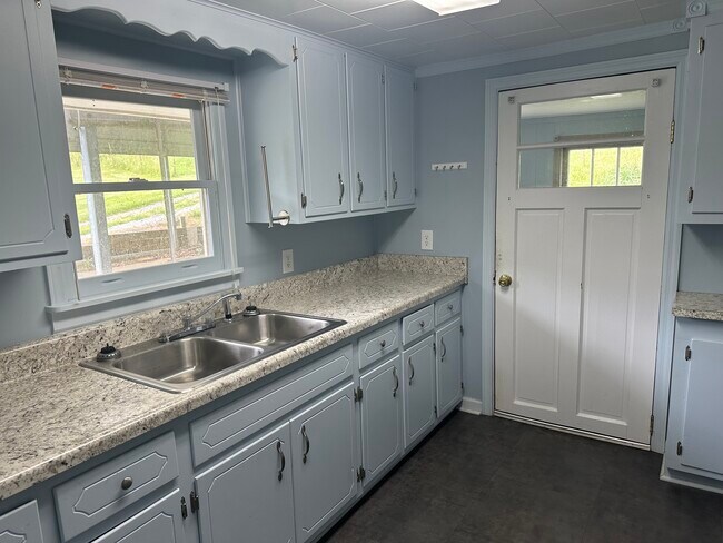 Kitchen with door to mud room - 479 Edwin Blevins RD
