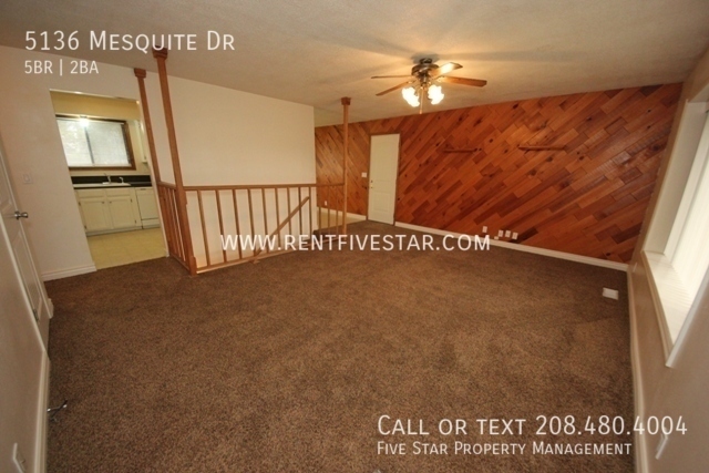 Building Photo - Spacious 5 Bedroom Home with Fenced Yard! ...