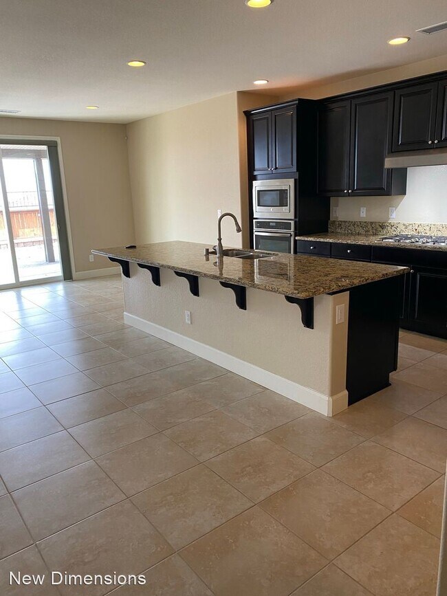 Building Photo - 4 br, 3 bath House - 10065 Barrel Racer Drive