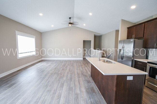 Building Photo - Two free months rent! New 4 Bedroom Ranch in Clive with finished Basement.