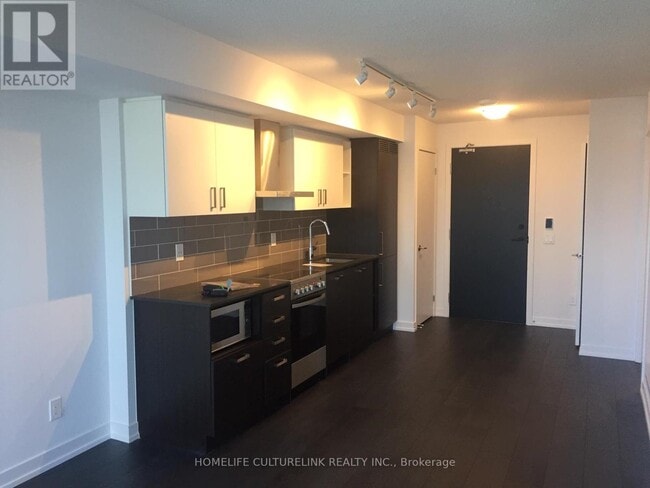 Photo du bâtiment - 125-2125 Redpath Ave