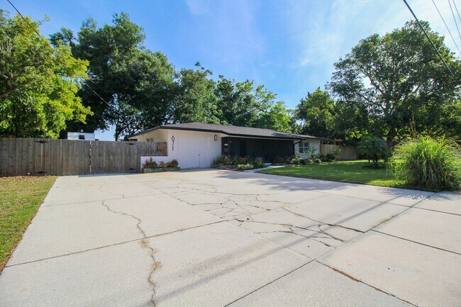 Building Photo - West of Trail Mid-Century Gem with New Designer Kitchen & Oversized Corner Lot