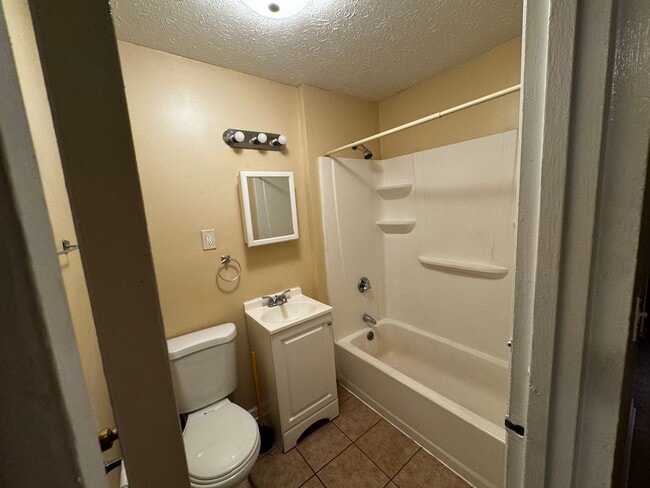 Photo - 4 Bedrooms 2 Bath Apartment with Heat and Hot Water Included!!