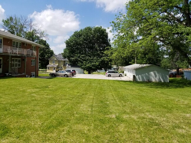 Large back lawn & parking - 110 N Maple St