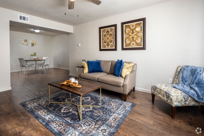 1BR, 1BA - 849SF - LIving Room - Pine Tree Apartments