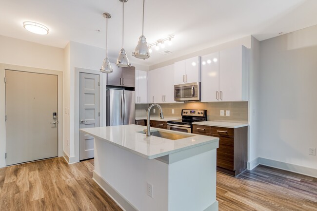 Our chef inspired kitchens feature designer finishes and stainless steel appliances. - Stadium Walk By Windsor