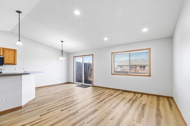 Building Photo - Spacious Family Home Featuring Deck, Garage & Updated Finishes